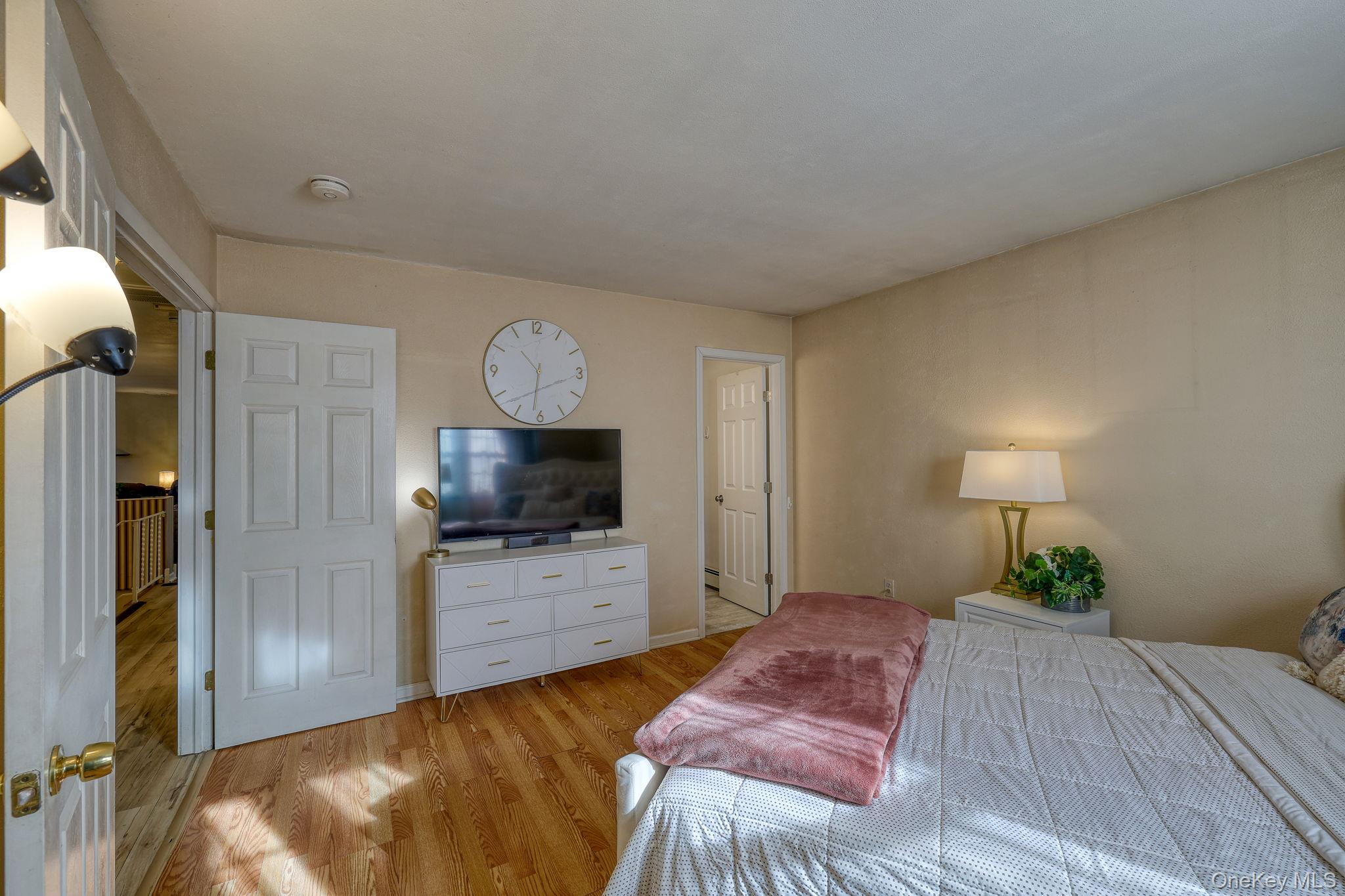 1 Townsend Street New Windsor, NY 12553 - Photo 18 of 36 a bedroom with a bed and a television in it