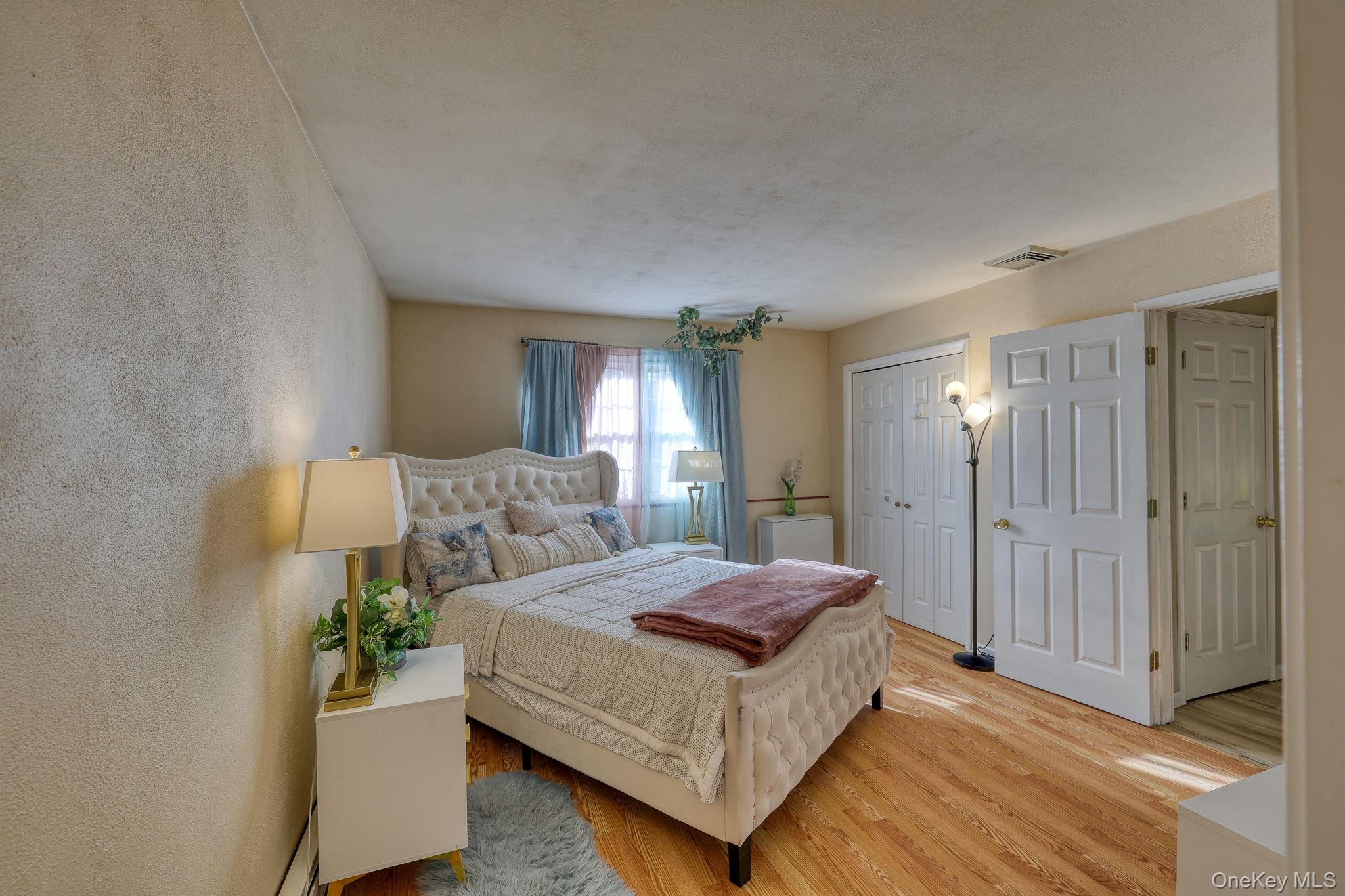 1 Townsend Street New Windsor, NY 12553 - Photo 19 of 36 a spacious bedroom with a bed and window