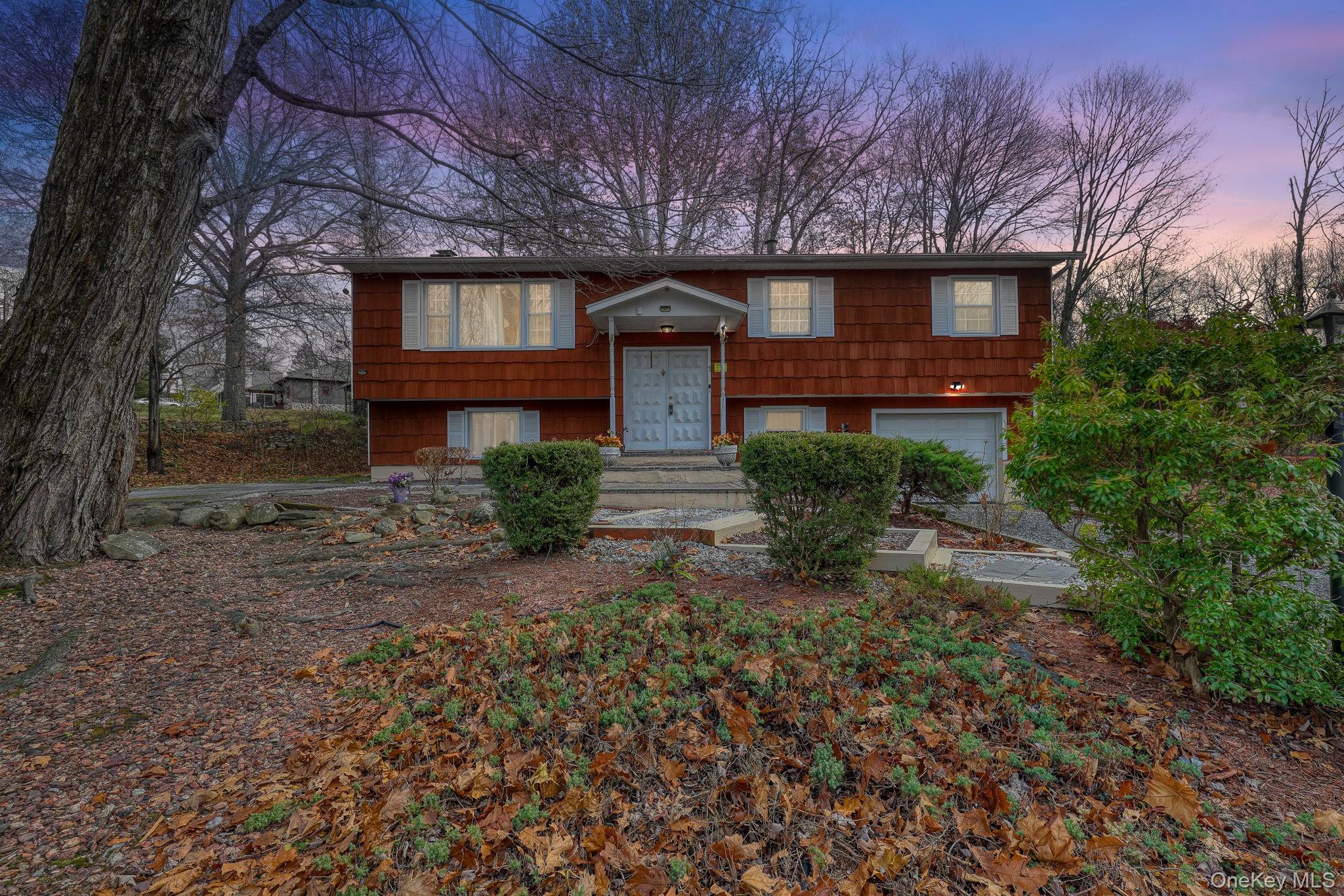 1 Townsend Street New Windsor, NY 12553 - Photo 2 of 36 a front view of a house with garden