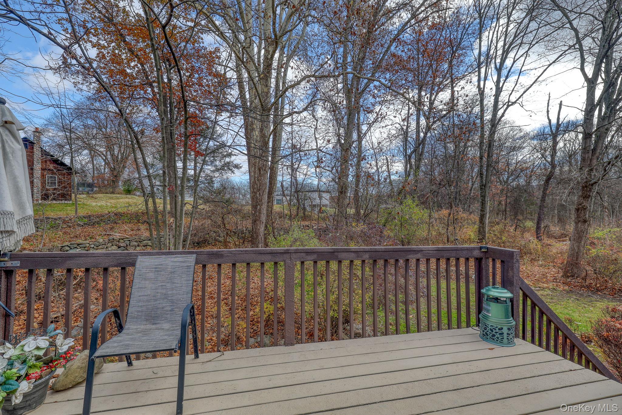 1 Townsend Street New Windsor, NY 12553 - Photo 35 of 36 a view of wooden deck with a trees