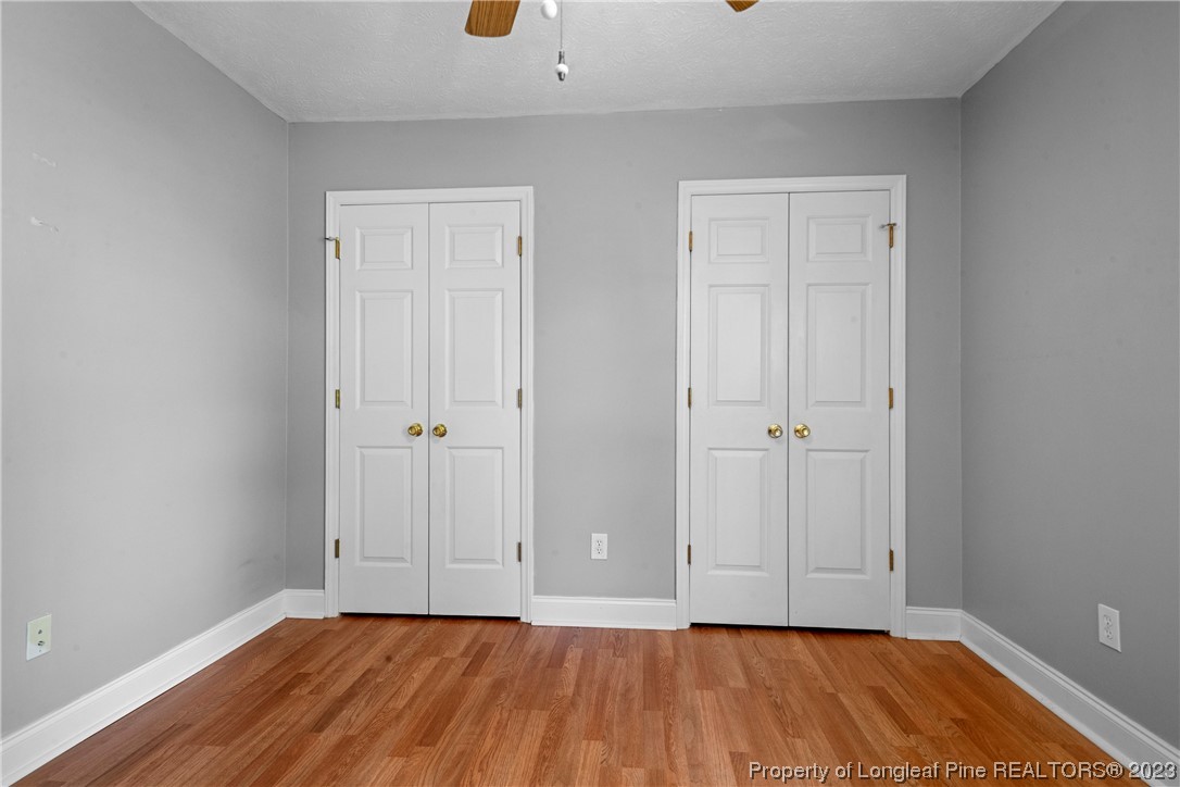 185 King Road Fayetteville, NC 28306 - Photo 18 of 24 a view of an empty room with wooden floor