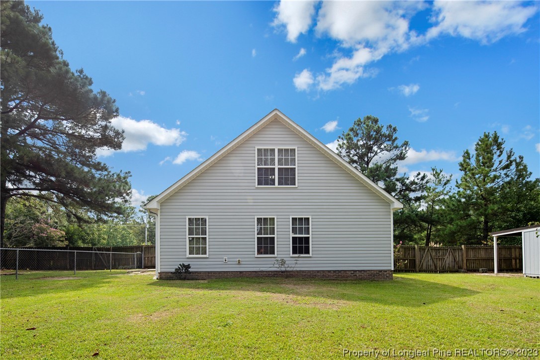 185 King Road Fayetteville, NC 28306 - Photo 21 of 24 a view of a house with a yard