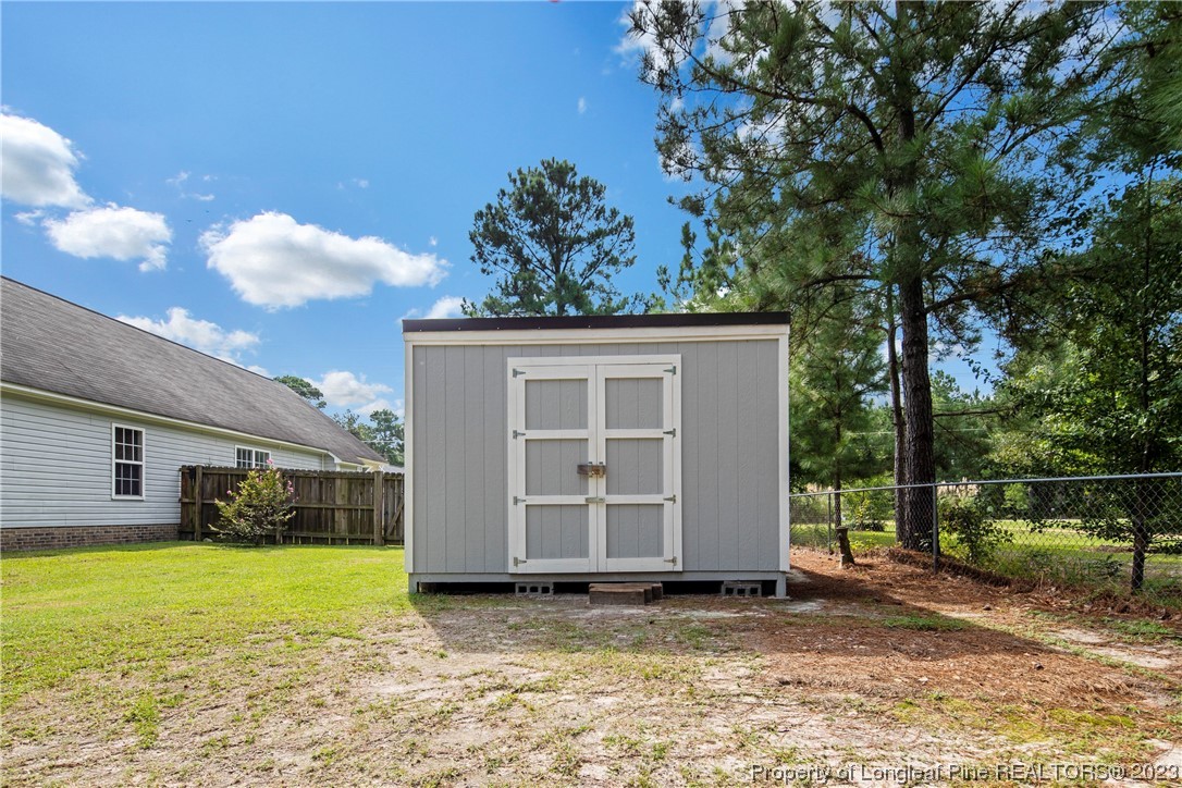185 King Road Fayetteville, NC 28306 - Photo 22 of 24 a view of a house with a back yard