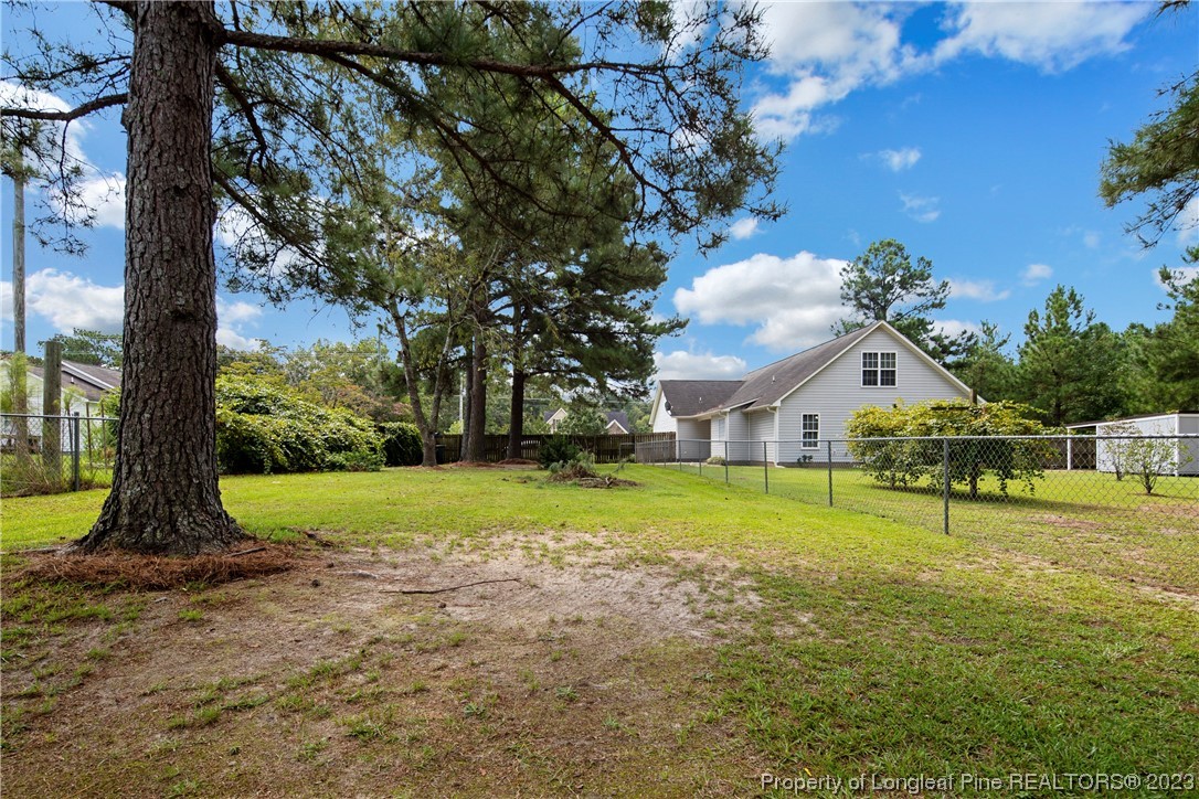 185 King Road Fayetteville, NC 28306 - Photo 24 of 24 a view of a house with garden and trees