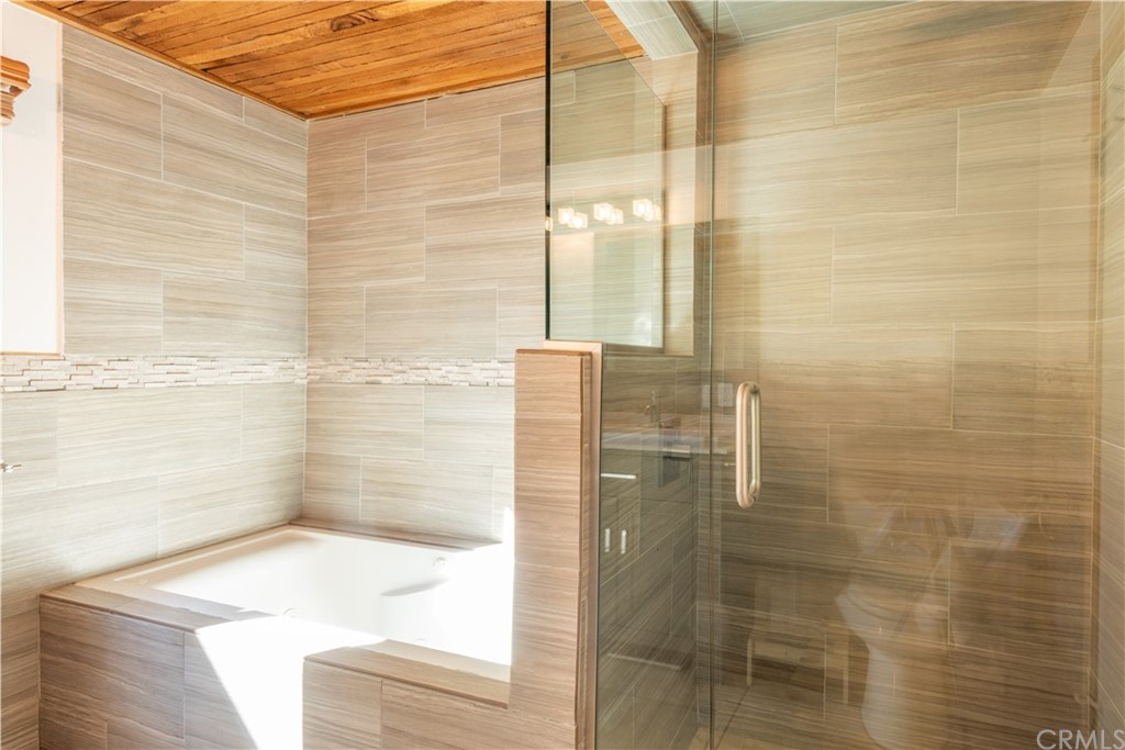 4329 Vía Azalea Palos Verdes Estates, CA 90274 - Photo 12 of 31 a bathroom with a bathtub and shower