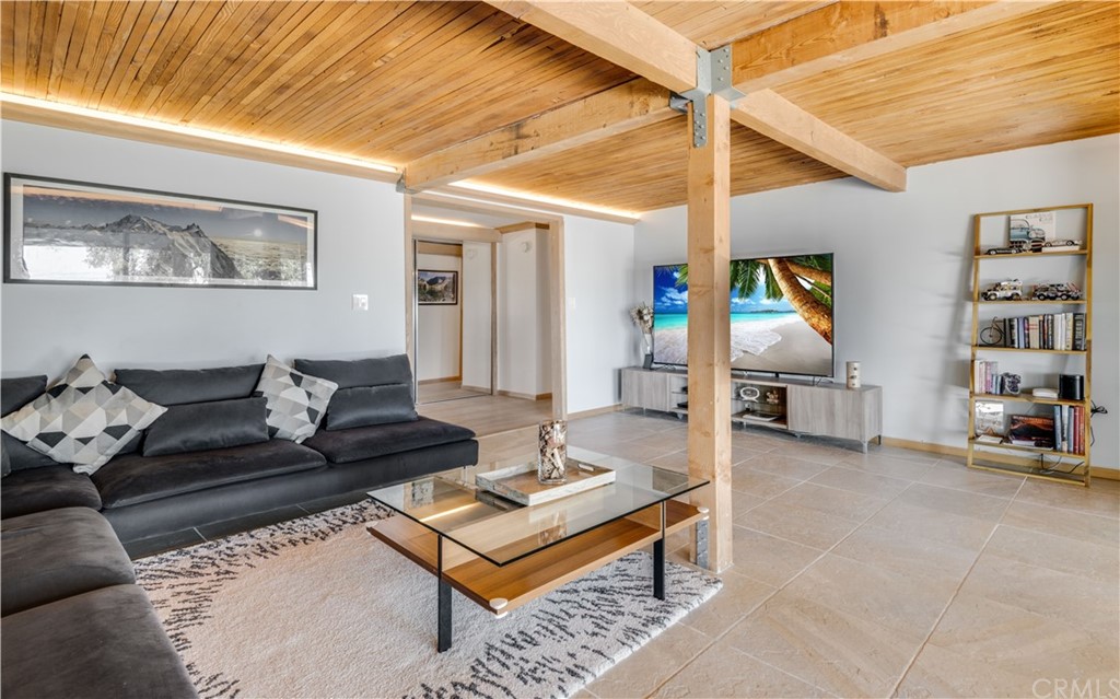 4329 Vía Azalea Palos Verdes Estates, CA 90274 - Photo 19 of 31 a living room with furniture a rug and a large window
