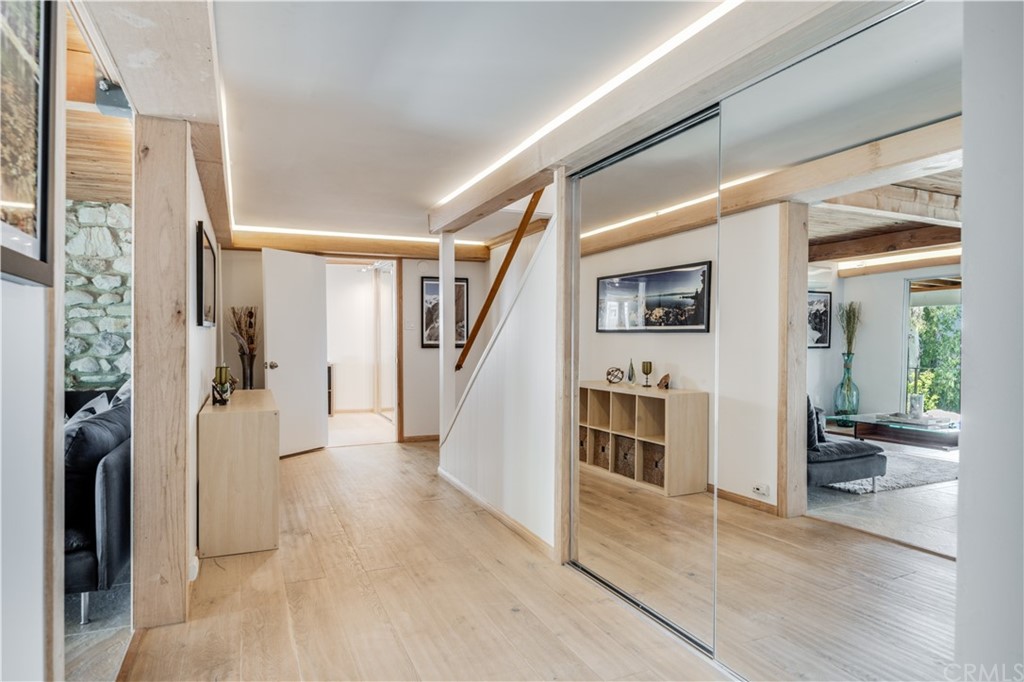 4329 Vía Azalea Palos Verdes Estates, CA 90274 - Photo 20 of 31 a view of a hallway with wooden floor and dining room