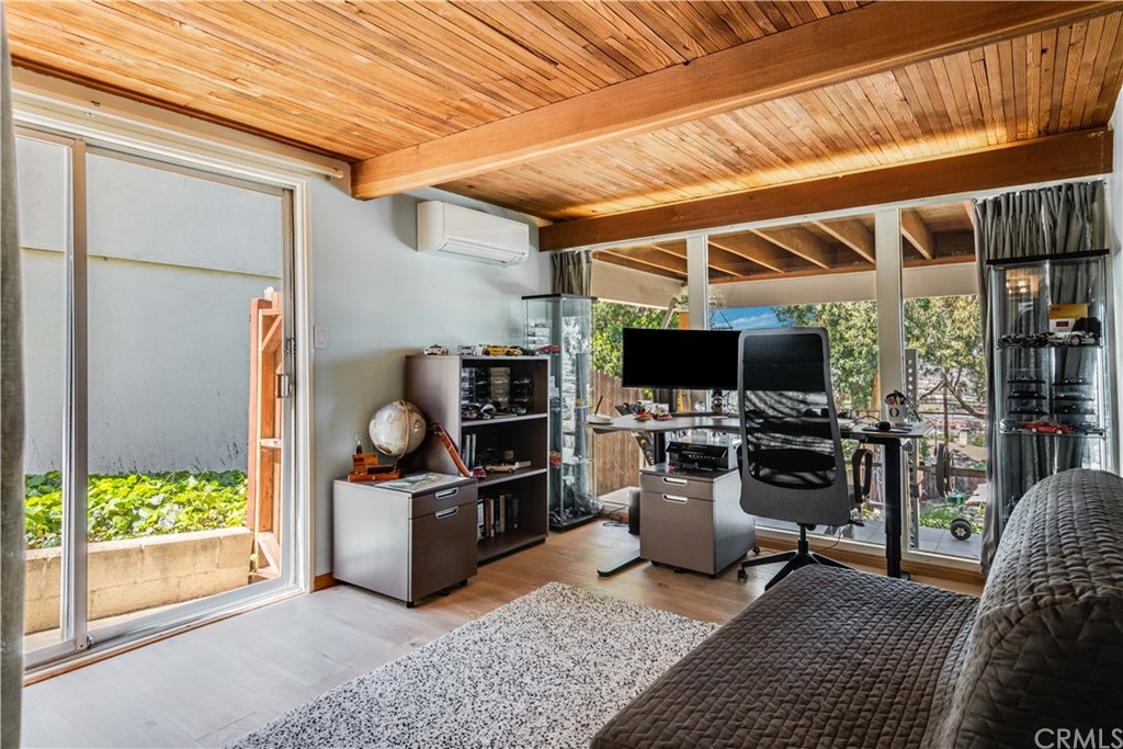 4329 Vía Azalea Palos Verdes Estates, CA 90274 - Photo 22 of 31 a living room with furniture and a flat screen tv