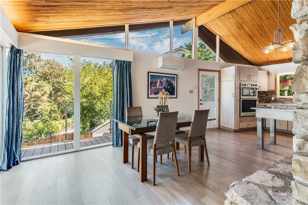 4329 Vía Azalea Palos Verdes Estates, CA 90274 - Photo 7 of 31 a view of a dining room with furniture window and wooden floor