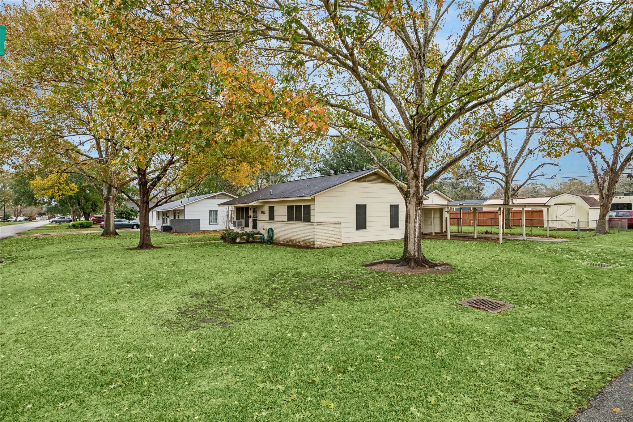 1733 Jones Street Rosenberg, TX 77471 - Photo 1 of 10 a front view of a house with a yard