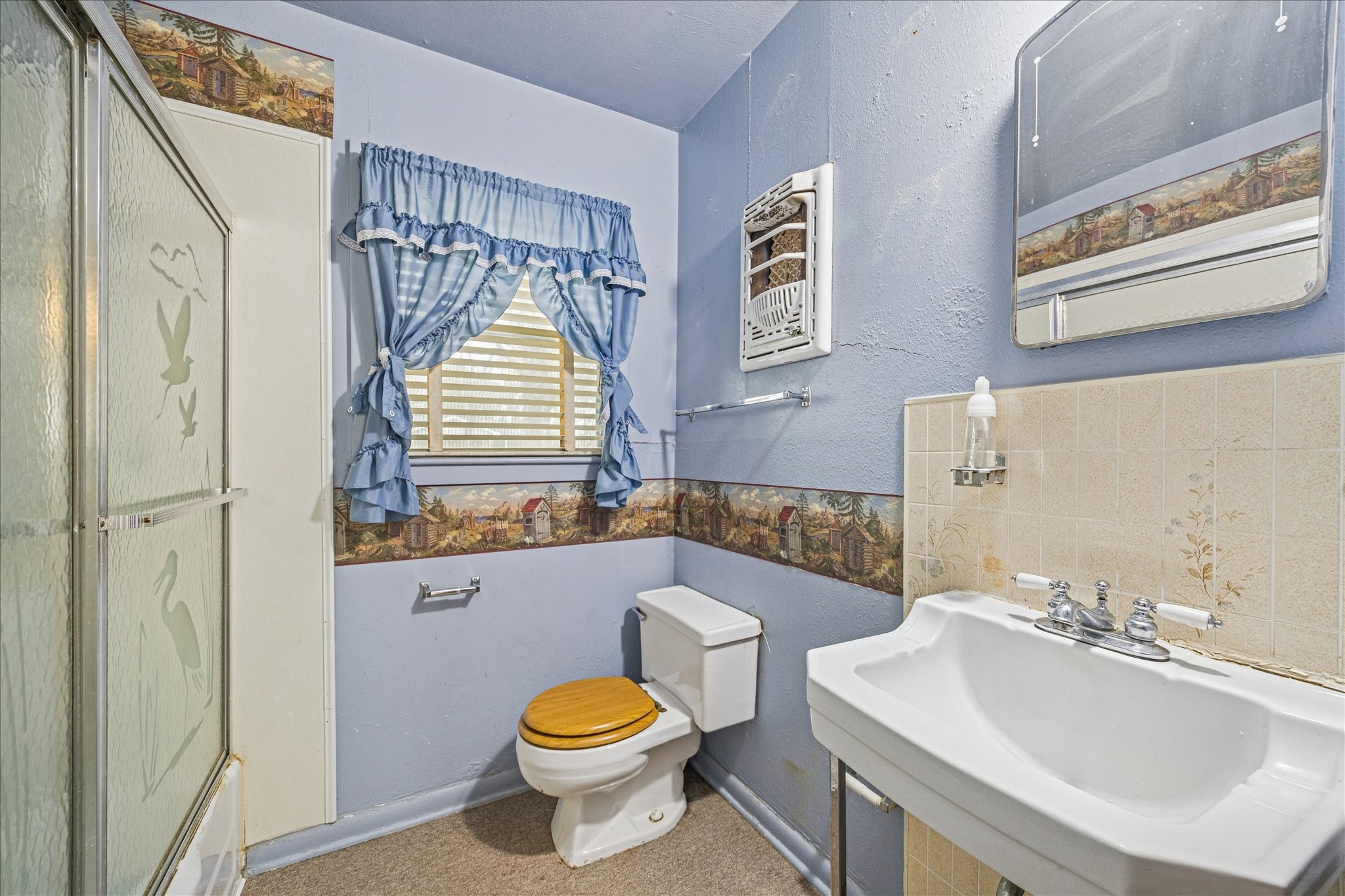 1733 Jones Street Rosenberg, TX 77471 - Photo 10 of 10 a bathroom with a sink a toilet and tub