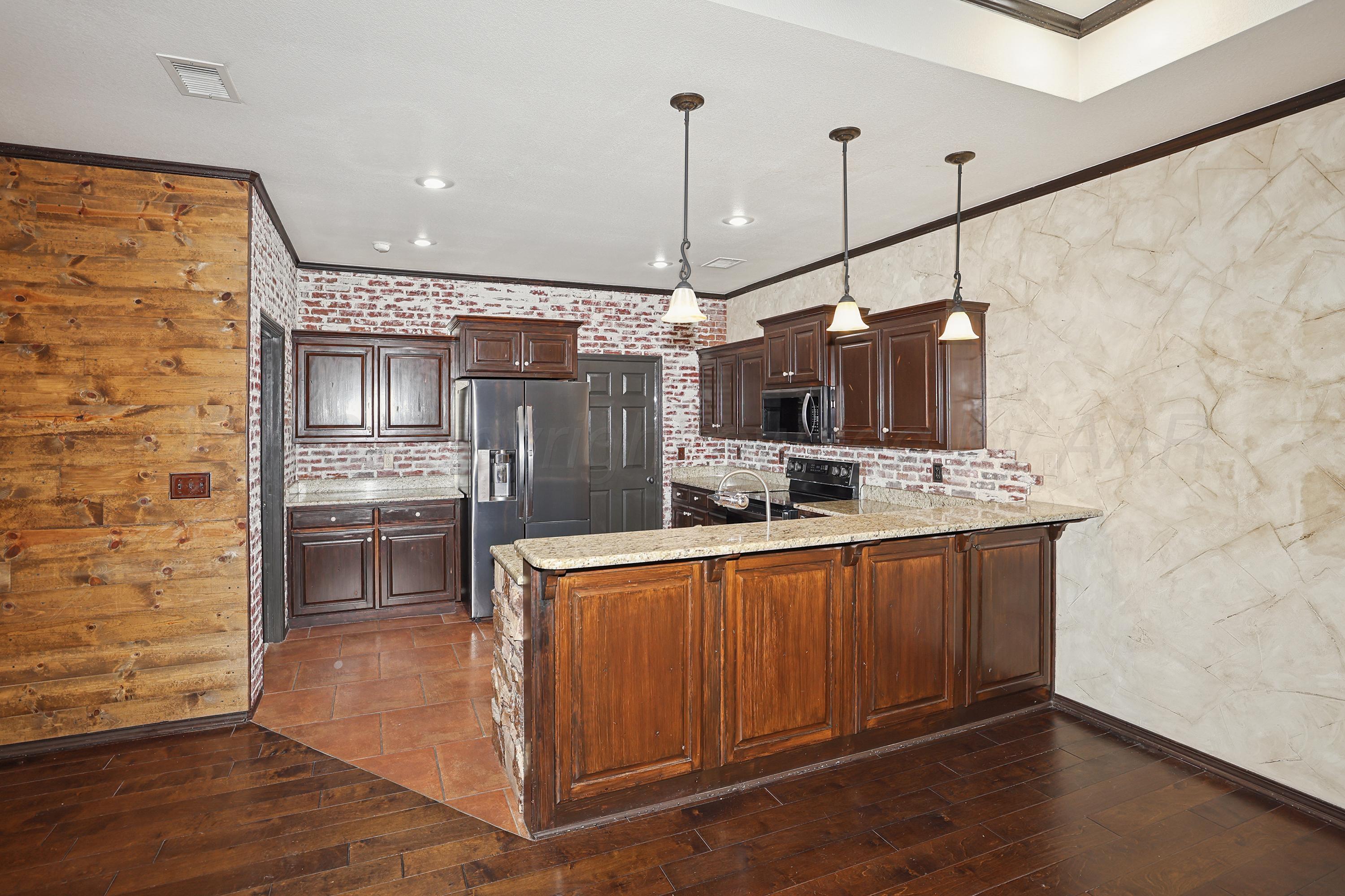 6803 Nick Street Amarillo, TX 79119 - Photo 9 of 33 11-Kitchen