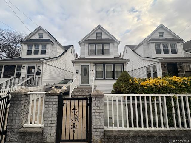 front view of a house with a small yard