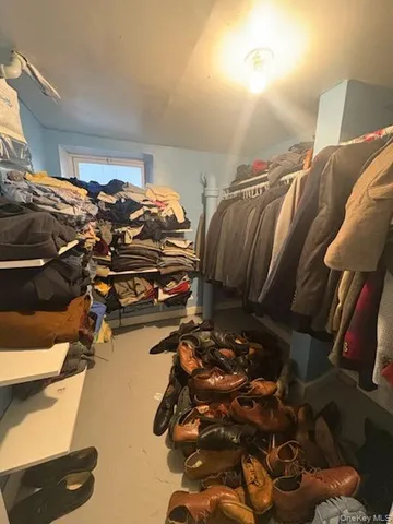 a living room with fireplace furniture and a flat screen tv