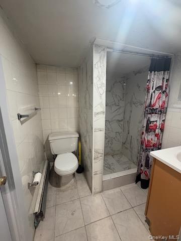 191-44 113th Road Queens, NY 11412 - Photo 29 of 31 a bathroom with a toilet and a shower