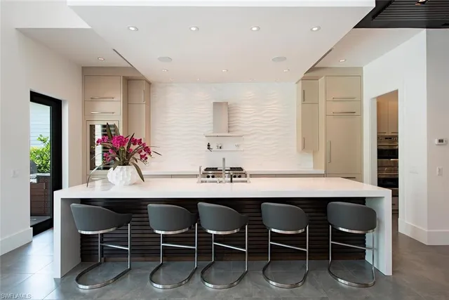 a view of a dining room and chairs