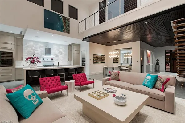 a living room with furniture and baby couch