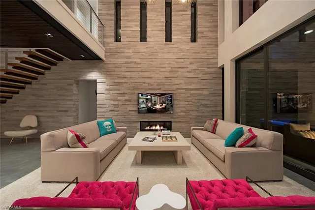 a view of a patio with couches table and chairs