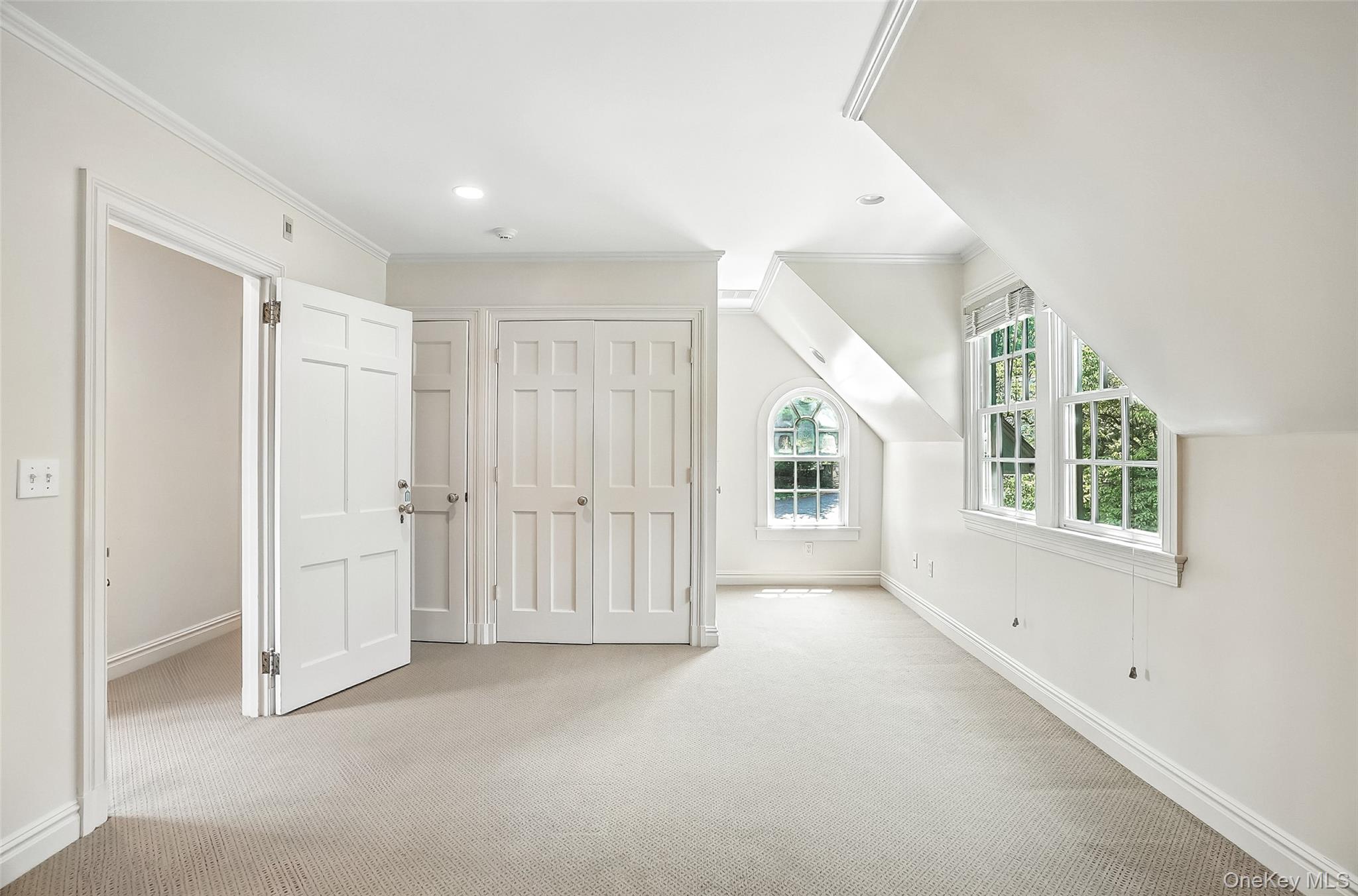 6 Club Road Rye, NY 10580 - Photo 17 of 28 an empty room with windows and closet