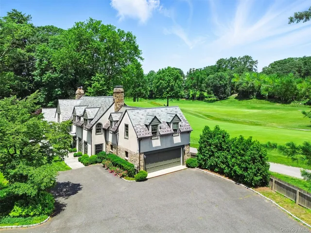 an aerial view of a house with garden