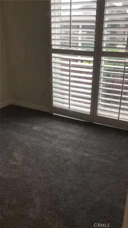 a view of a room with a window