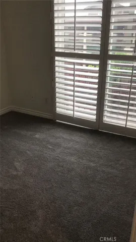 a view of a room with a window