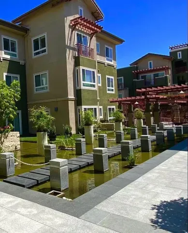 a view of a chairs and tables in the patio