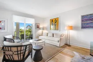 a kitchen with stainless steel appliances granite countertop a refrigerator and microwave