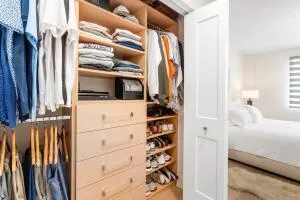 a view of a house with swimming pool and sitting area