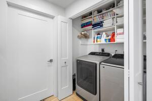 250 Northeast 3rd Avenue, Unit 1510 Delray Beach, FL 33444 - Photo 26 of 50 a utility room with dryer and washer