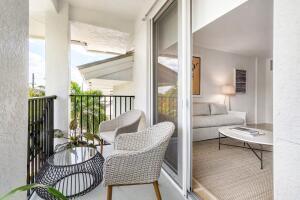 250 Northeast 3rd Avenue, Unit 1510 Delray Beach, FL 33444 - Photo 27 of 50 a living room with furniture and a window