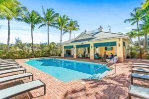 a view of washer and dryer with kitchen in the background
