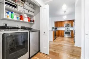a kitchen with stainless steel appliances granite countertop a stove and a refrigerator