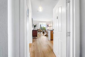 250 Northeast 3rd Avenue, Unit 1510 Delray Beach, FL 33444 - Photo 7 of 50 a view of living room with furniture and wooden floor