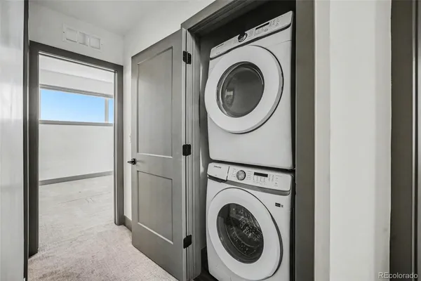 a view of a storage & utility room with washer and dryer
