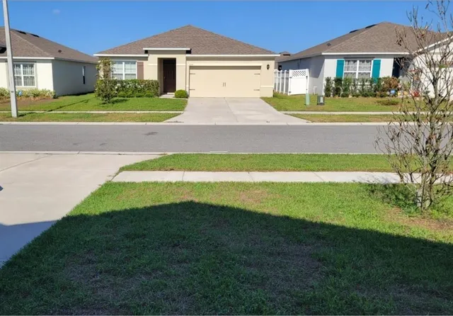 a view of outdoor space yard and front view of a house