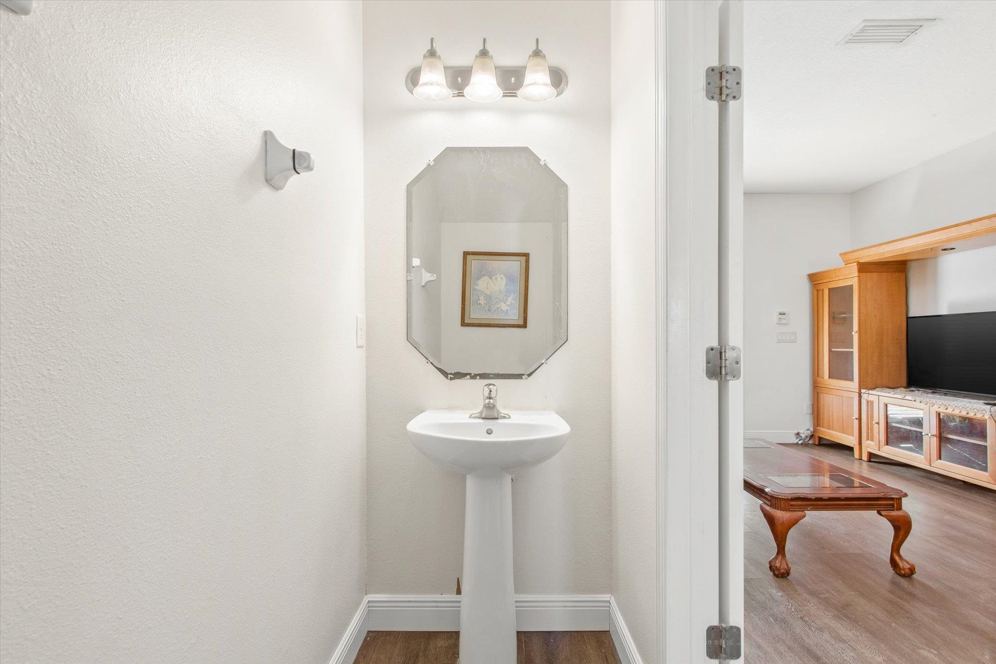 653 Drake Bay Terrace St. Augustine, FL 32084 - Photo 8 of 32 a view of living room with chair and fireplace