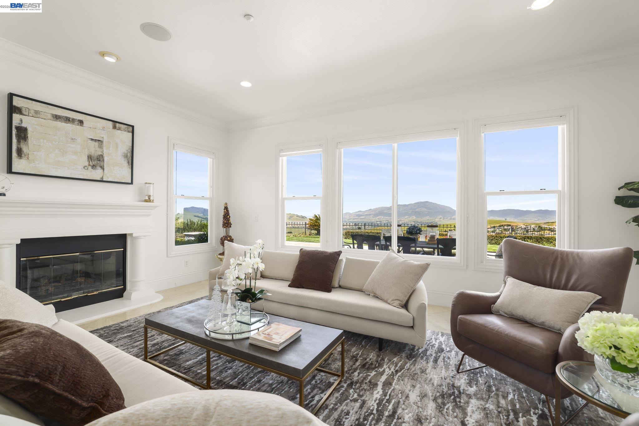 950 Winsford Court San Ramon, CA 94583 - Photo 12 of 68 a living room with furniture fireplace and a large window