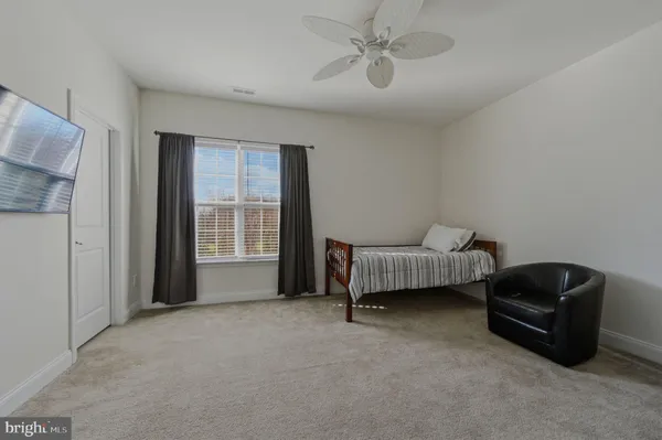 a view of a backyard with sitting area