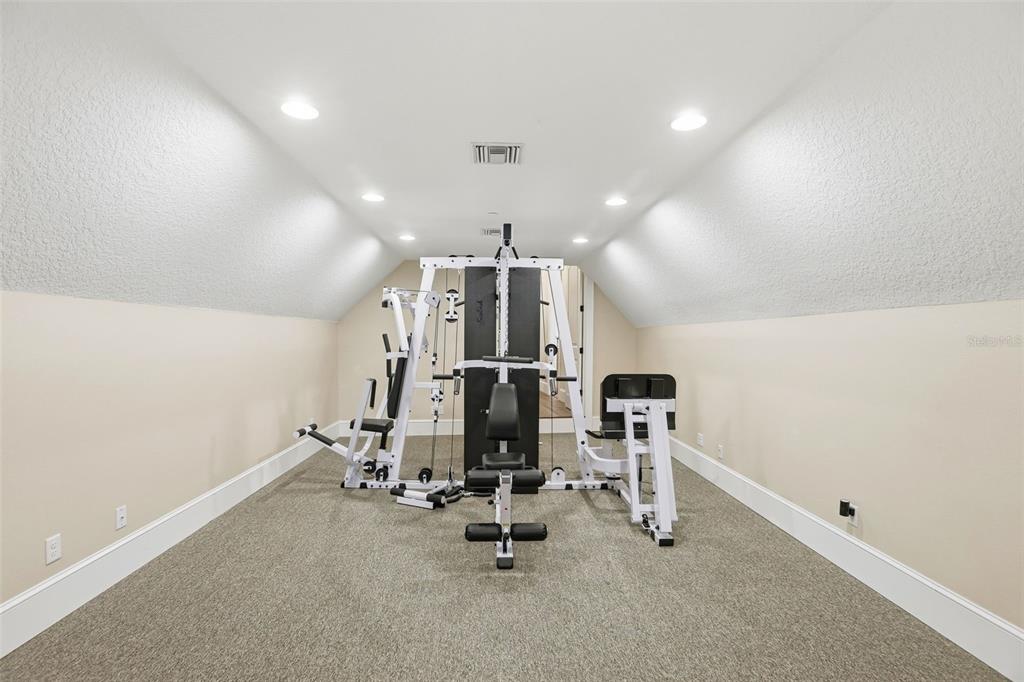 713 Main Street Windermere, FL 34786 - Photo 51 of 82 a view of a room with gym equipment