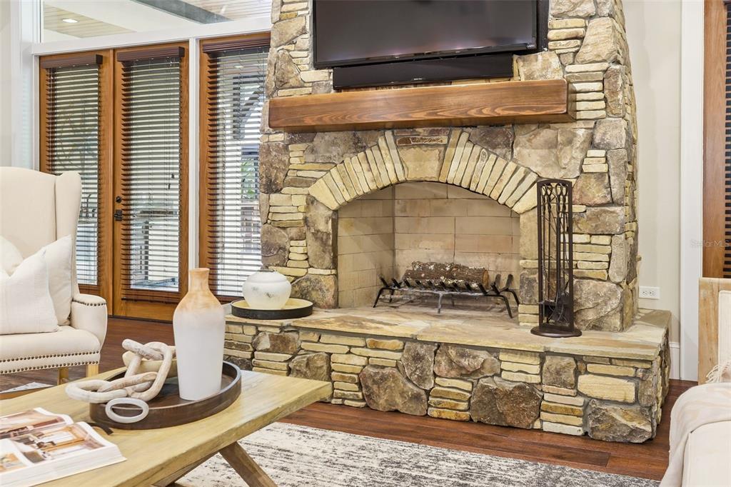 713 Main Street Windermere, FL 34786 - Photo 9 of 82 a living room with fireplace furniture and windows