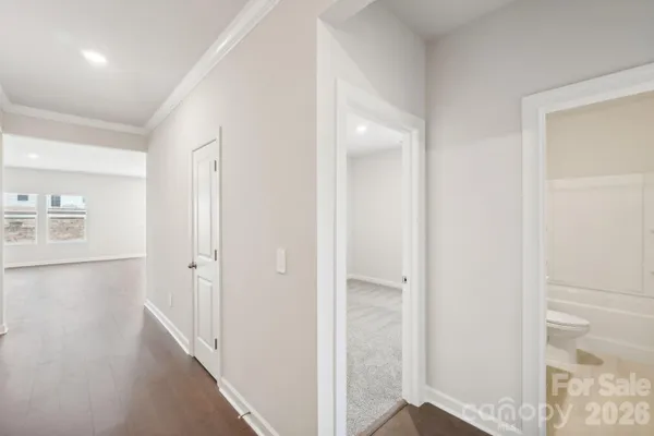a view of a bathroom with a glass door
