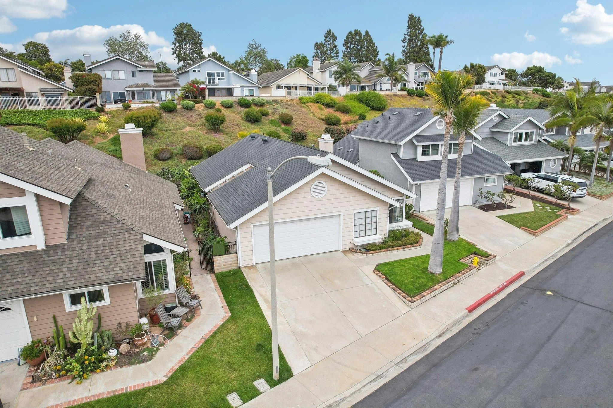 6872 Shearwaters Drive Carlsbad, CA 92011 - Photo 34 of 45 an aerial view of a house with a yard basket ball court and outdoor seating