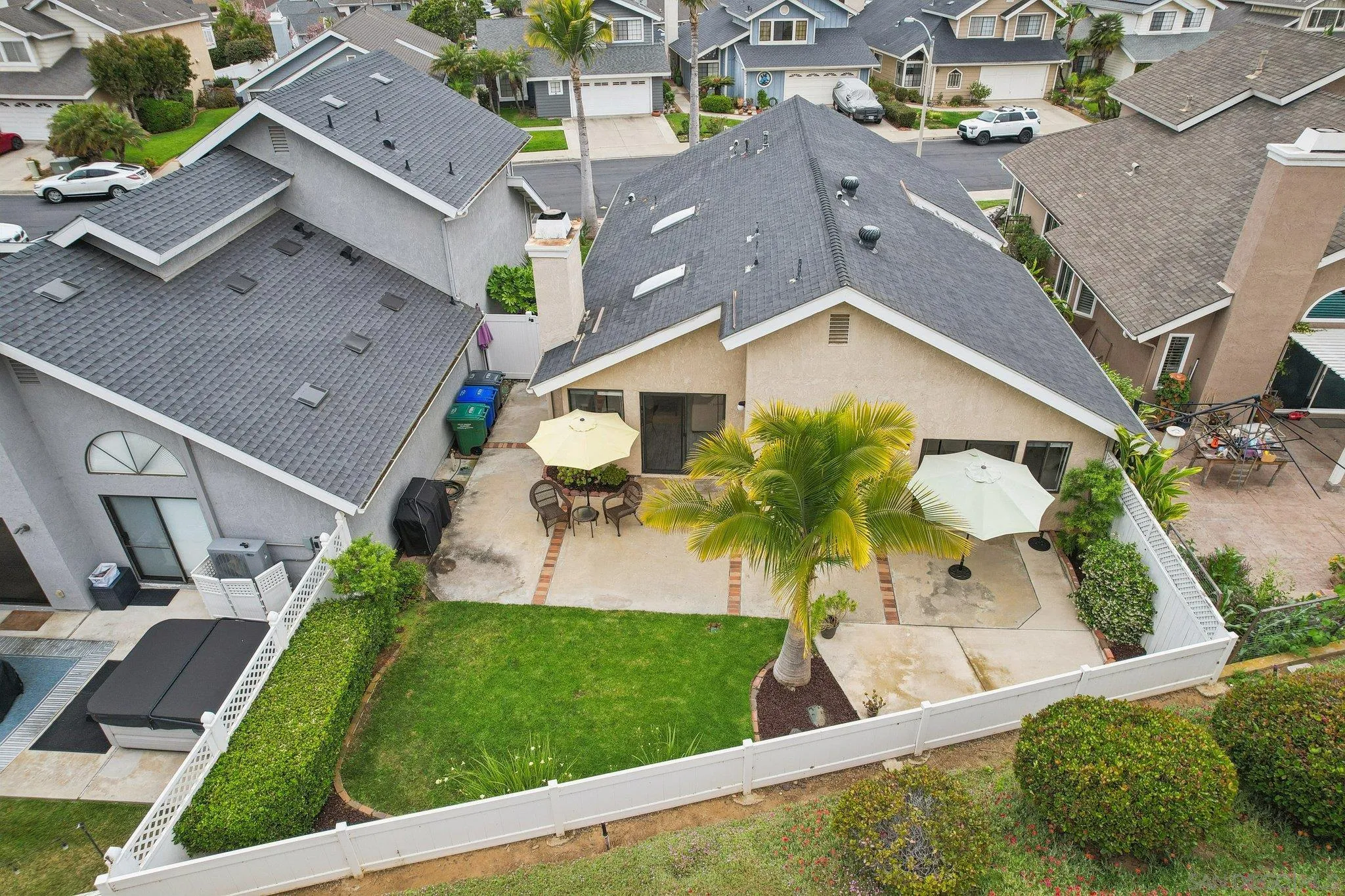 6872 Shearwaters Drive Carlsbad, CA 92011 - Photo 40 of 45 an aerial view of a house with a garden and plants