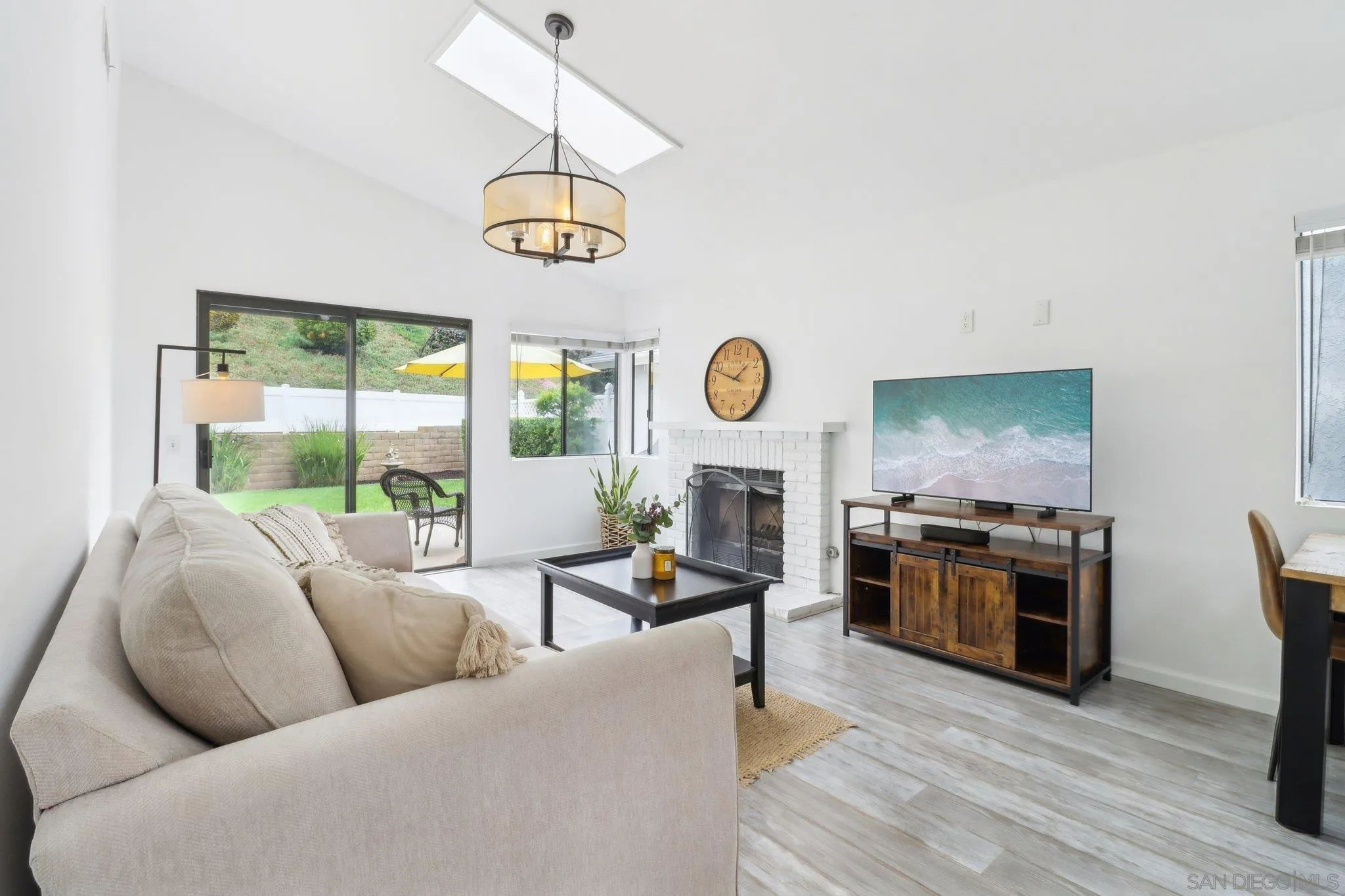 6872 Shearwaters Drive Carlsbad, CA 92011 - Photo 4 of 45 a living room with furniture kitchen view and a window