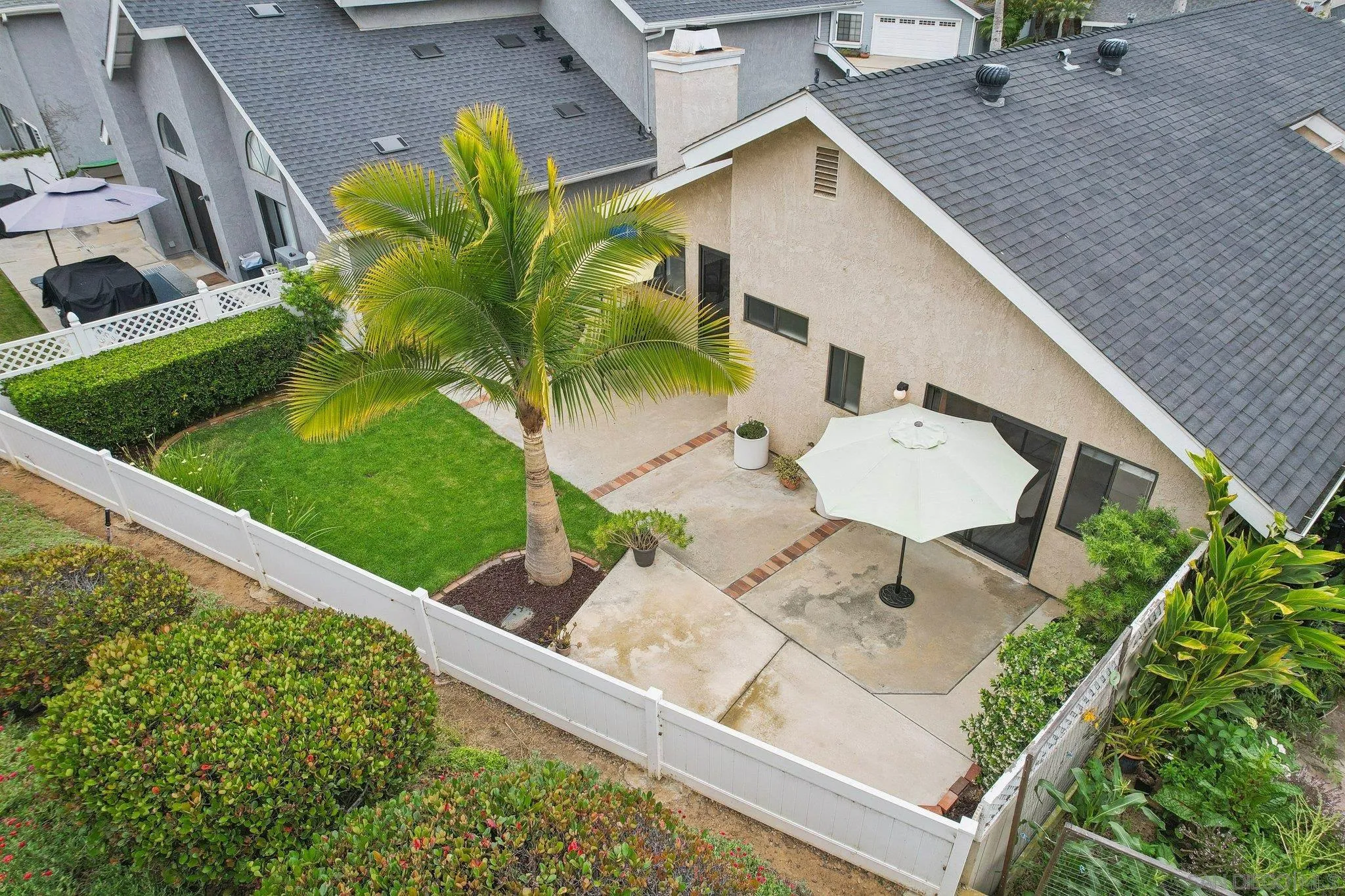 6872 Shearwaters Drive Carlsbad, CA 92011 - Photo 41 of 45 a view of a backyard with plants