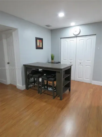 a view of a workspace with furniture