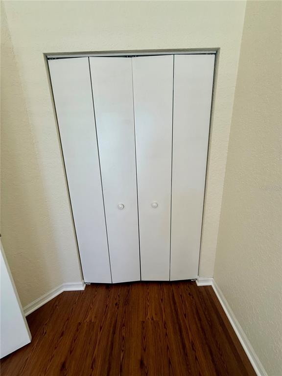 8037 Southwest 115th Loop Ocala, FL 34481 - Photo 36 of 47 a view of a room with wooden floor