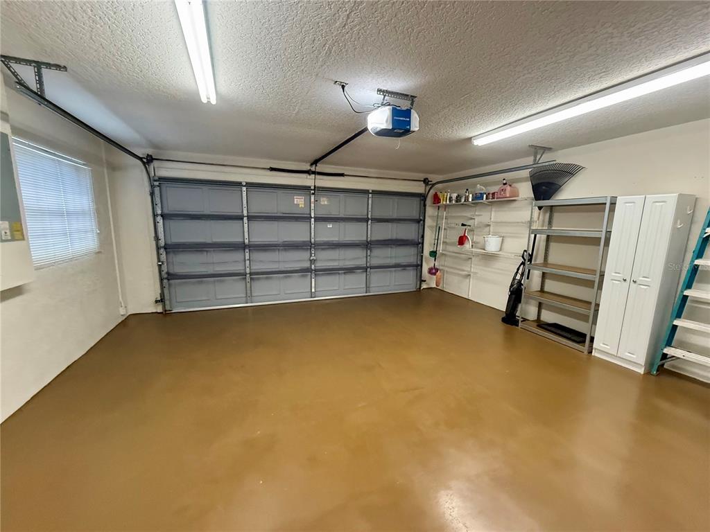 8037 Southwest 115th Loop Ocala, FL 34481 - Photo 45 of 47 a view of an empty room with a fireplace