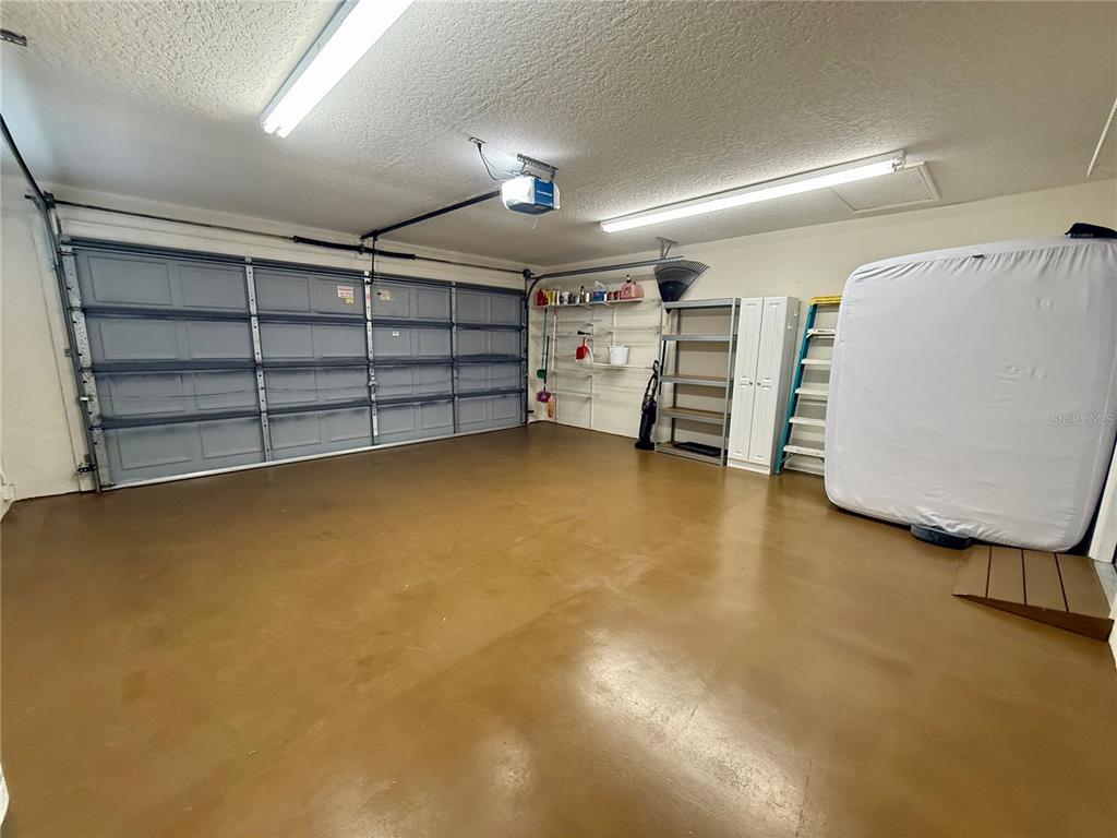 8037 Southwest 115th Loop Ocala, FL 34481 - Photo 46 of 47 a view of a room with storage and utility
